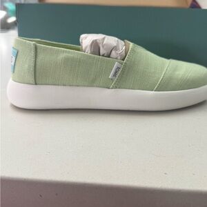 TOMS Light Green Canvas Slip-Ons